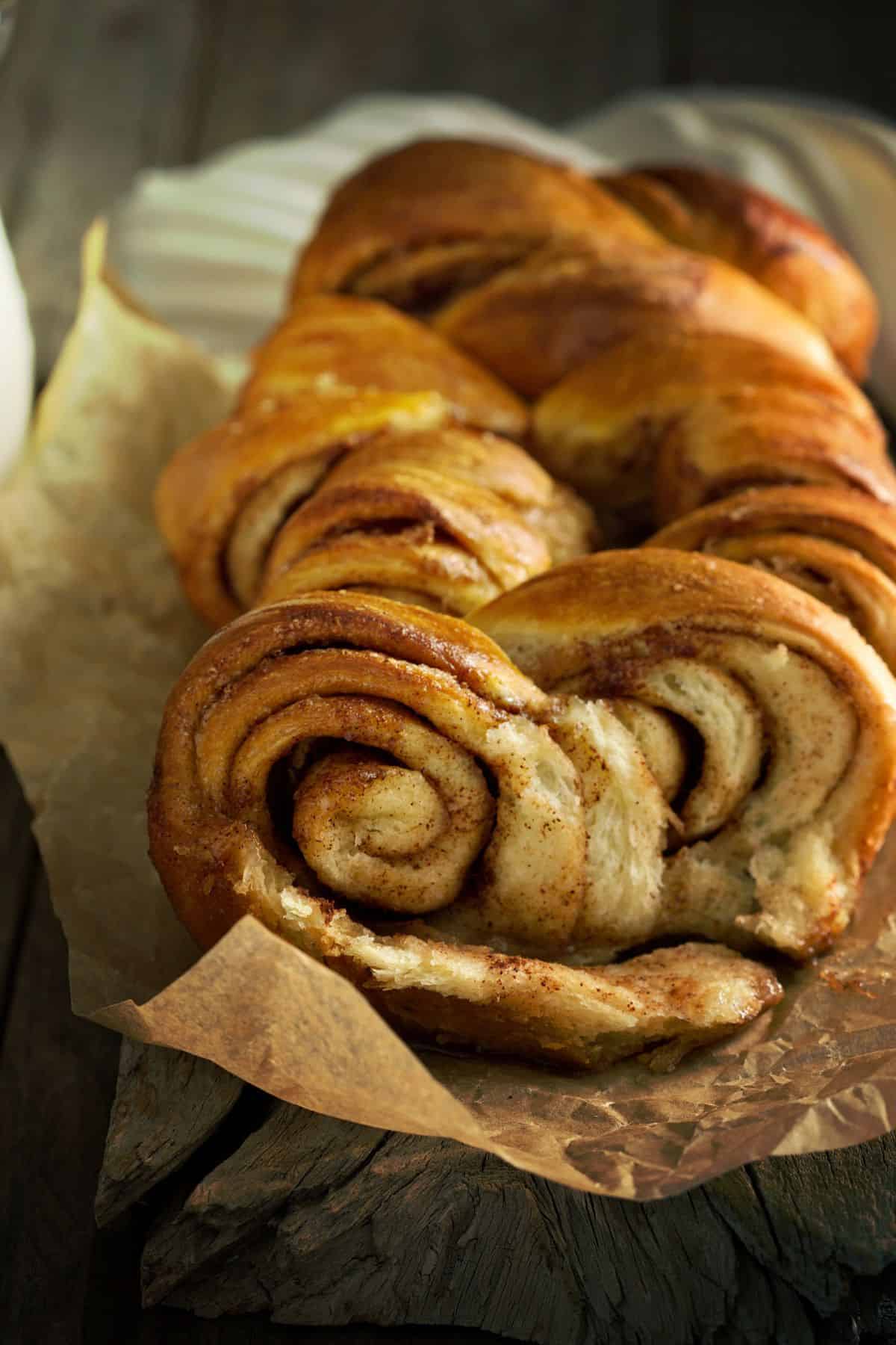 Close up of a loaf of cinnamon pull-apart bread, warm and fresh from the oven, waiting to be shared!