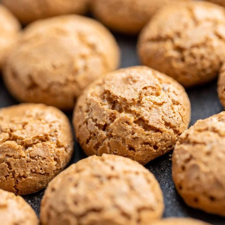 Close up of a freshly baked batch of almond sugar cookies