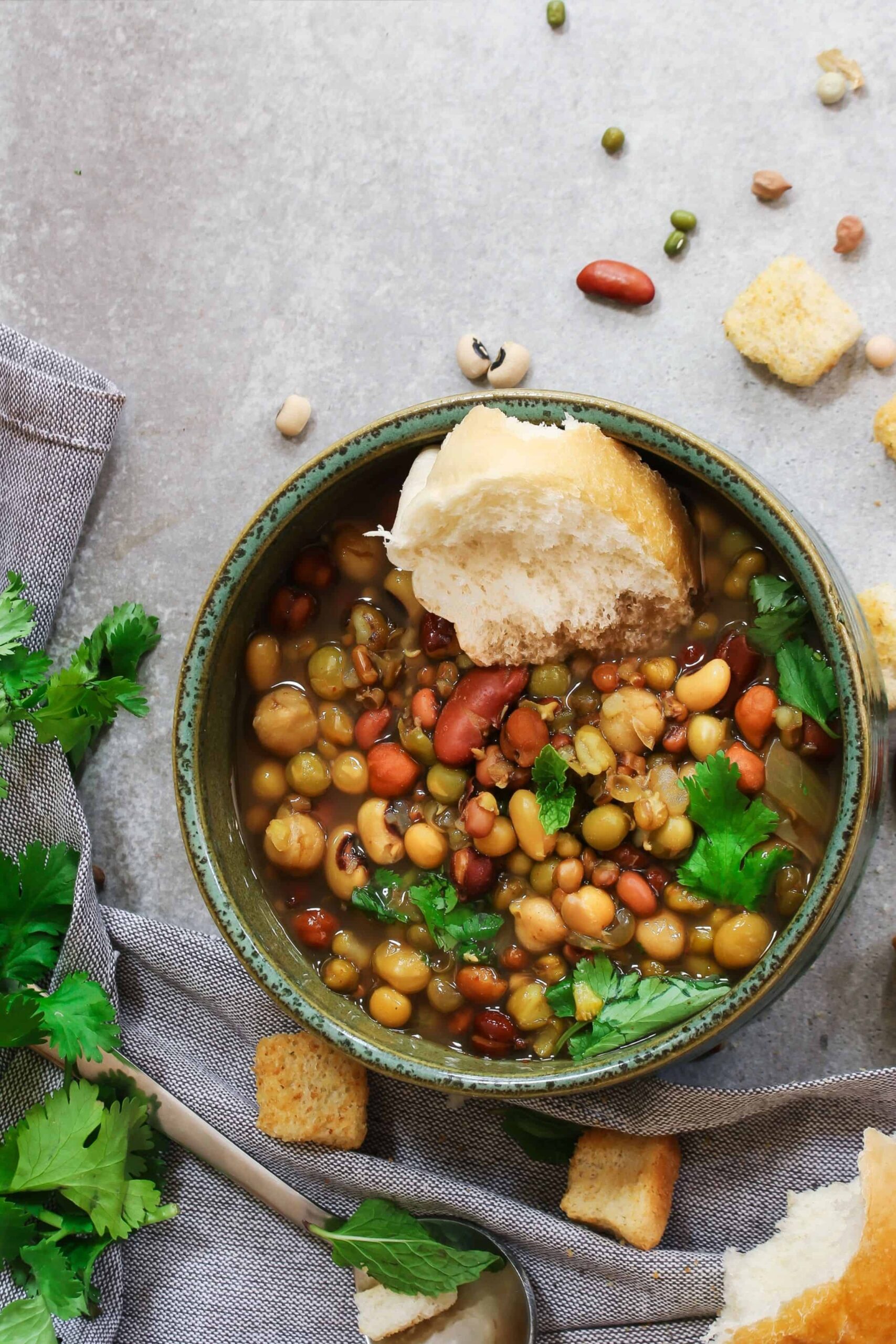 Delicious 7 beans soup with homemade bread and fresh herbs.