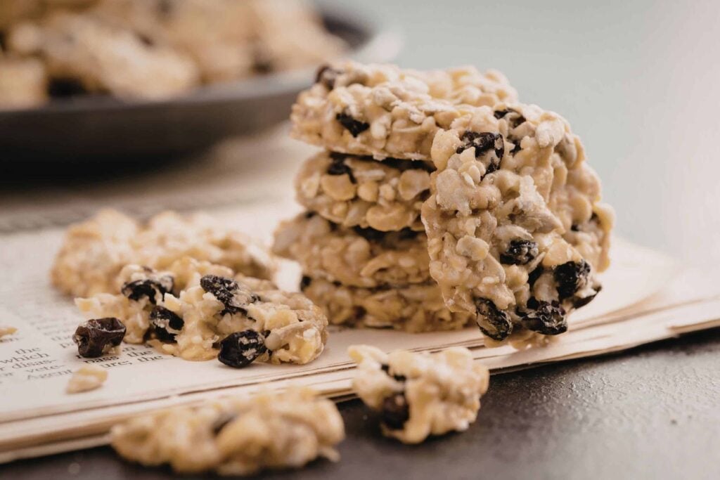 Oatmeal raisin protein cookies sitting in a stack