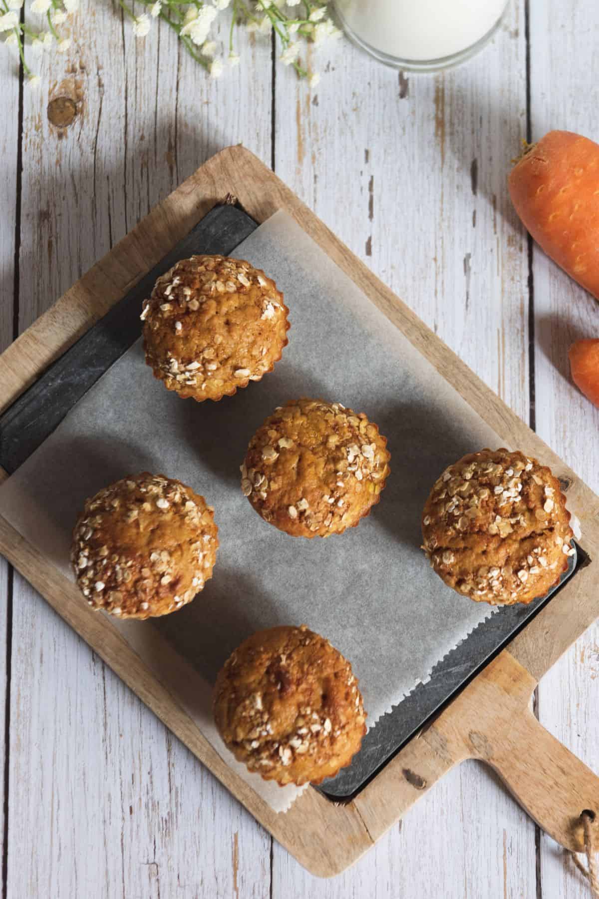 Morning glory muffins on a wooden tray