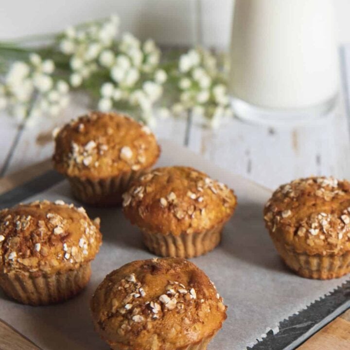 Freshly baked morning glory muffins on a tray