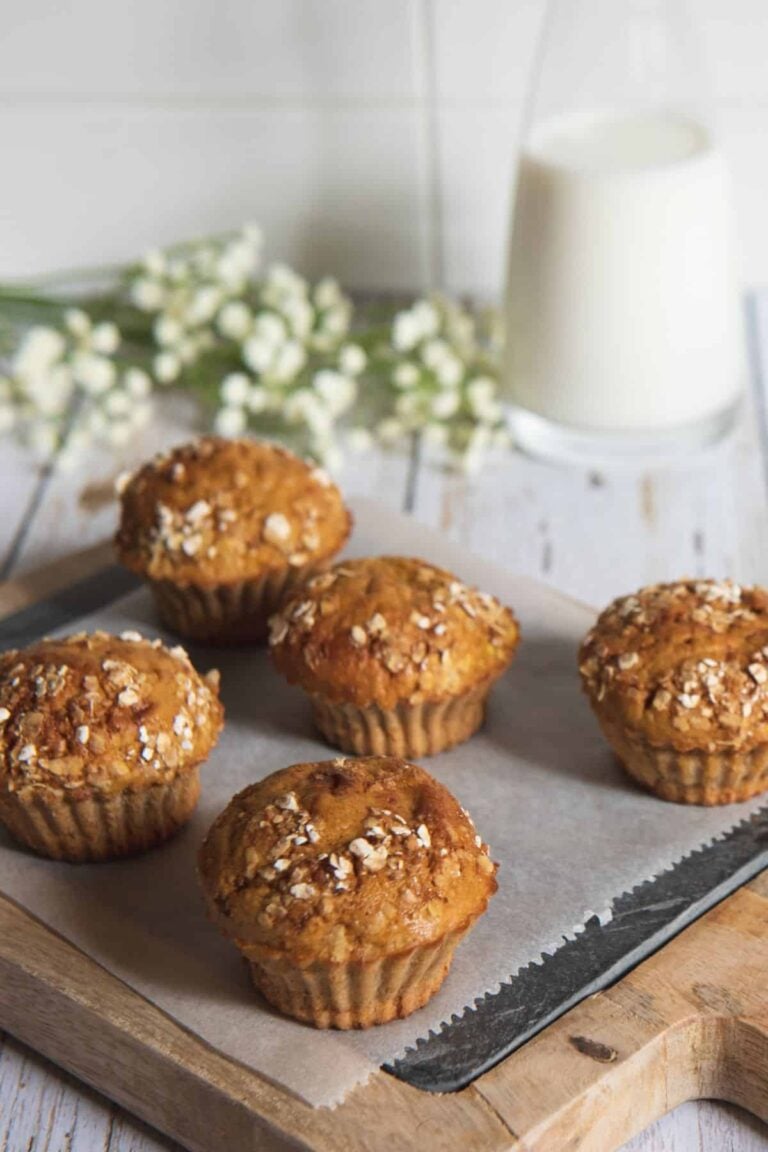 Freshly baked morning glory muffins on a tray